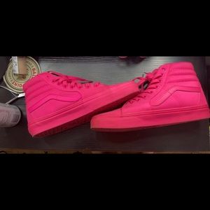 Neon pink high top vans
